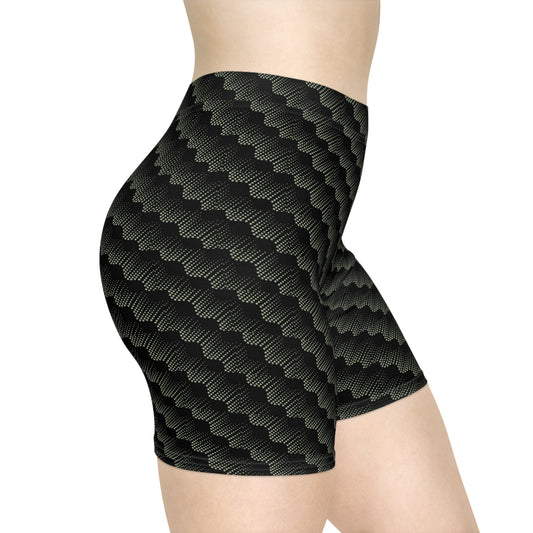 Right side view of black with abstract sage pattern athletic shorts modeled by female with white background. These biker shorts make great gifts for women who love comfortable, stylish activewear.