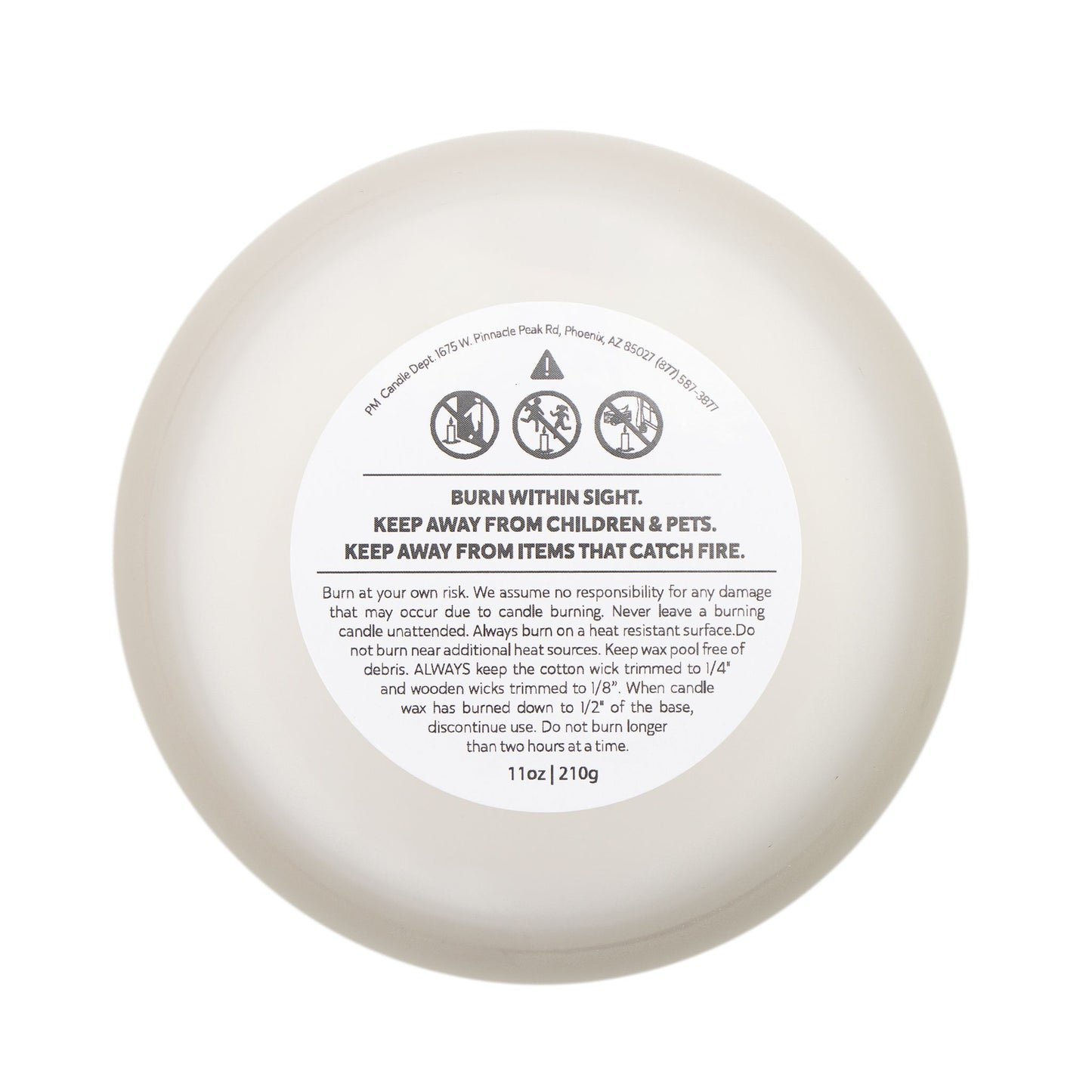 Bottom of frosted glass candle showing label with burn instructions. This funny candle makes a great gift for women.