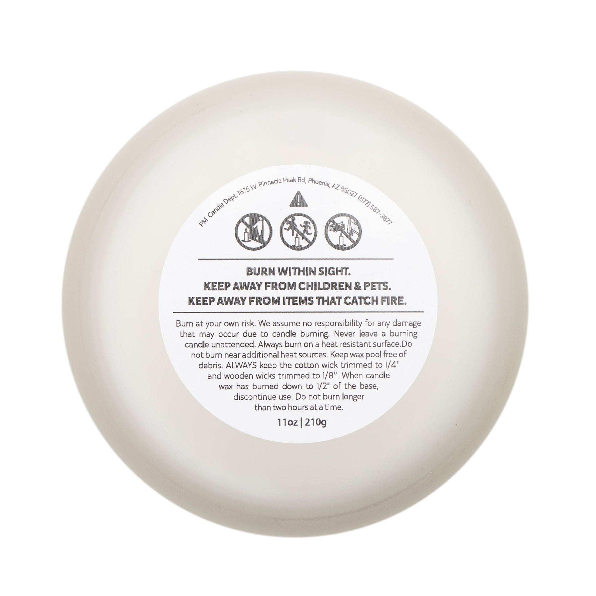 Bottom of frosted glass candle showing label with burn instructions. This funny candle makes a great gift for women.